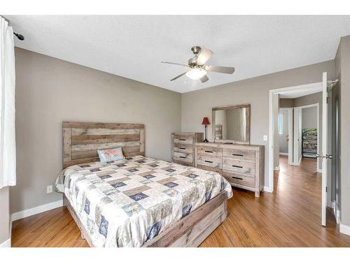 285 Hidden Spring Green Nw, Calgary, AB - Indoor Photo Showing Bedroom