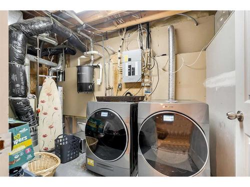 285 Hidden Spring Green Nw, Calgary, AB - Indoor Photo Showing Laundry Room