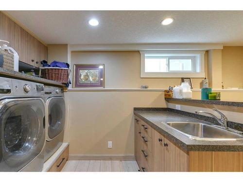 136 Holmwood Avenue Nw, Calgary, AB - Indoor Photo Showing Laundry Room