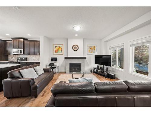 44 Walgrove Green Se, Calgary, AB - Indoor Photo Showing Living Room With Fireplace