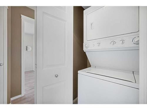 24 Panamount Gate Nw, Calgary, AB - Indoor Photo Showing Laundry Room