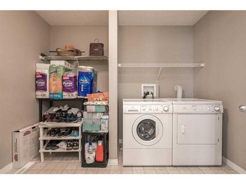 129 Millrise Square Sw, Calgary, AB - Indoor Photo Showing Laundry Room
