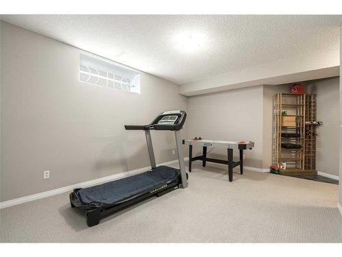 129 Millrise Square Sw, Calgary, AB - Indoor Photo Showing Gym Room