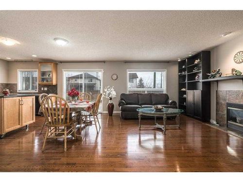 129 Millrise Square Sw, Calgary, AB - Indoor With Fireplace