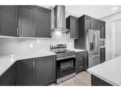 245 Carringham Way Nw, Calgary, AB - Indoor Photo Showing Kitchen With Upgraded Kitchen