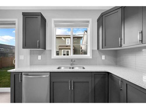 245 Carringham Way Nw, Calgary, AB - Indoor Photo Showing Kitchen With Upgraded Kitchen