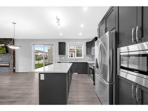 245 Carringham Way Nw, Calgary, AB - Indoor Photo Showing Kitchen With Upgraded Kitchen