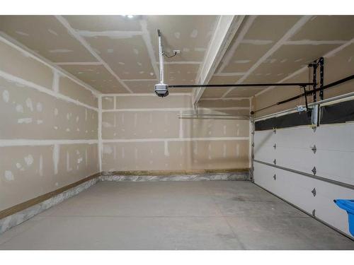 245 Carringham Way Nw, Calgary, AB - Indoor Photo Showing Garage