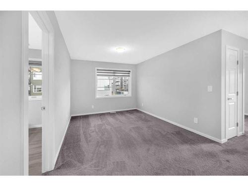 245 Carringham Way Nw, Calgary, AB - Indoor Photo Showing Other Room
