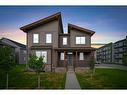 245 Carringham Way Nw, Calgary, AB  - Outdoor With Facade 