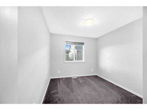 245 Carringham Way Nw, Calgary, AB - Indoor Photo Showing Other Room