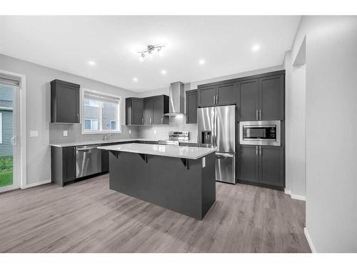 245 Carringham Way Nw, Calgary, AB - Indoor Photo Showing Kitchen With Upgraded Kitchen