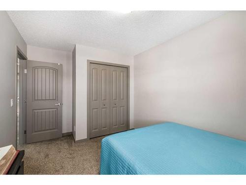 40 Legacy Reach Manor Se, Calgary, AB - Indoor Photo Showing Bedroom