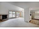 35-2225 Oakmoor Drive Sw, Calgary, AB  - Indoor With Fireplace 