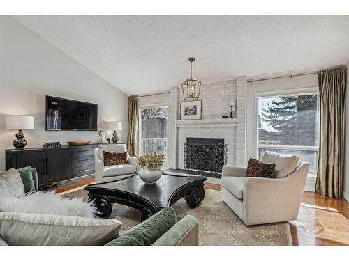 164 Scandia Hill Nw, Calgary, AB - Indoor Photo Showing Living Room With Fireplace