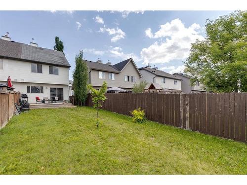 107 Elgin Point Se, Calgary, AB - Outdoor With Backyard
