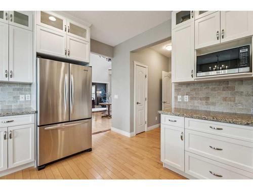 210 Montenaro Place, Rural Rocky View County, AB - Indoor Photo Showing Kitchen With Stainless Steel Kitchen