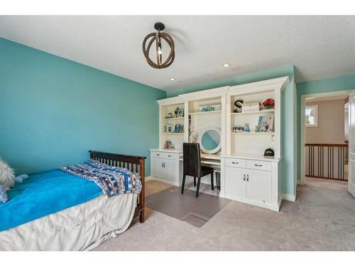 210 Montenaro Place, Rural Rocky View County, AB - Indoor Photo Showing Bedroom