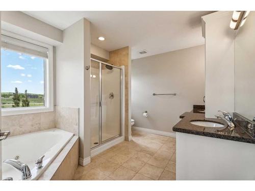 210 Montenaro Place, Rural Rocky View County, AB - Indoor Photo Showing Bathroom