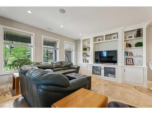 210 Montenaro Place, Rural Rocky View County, AB - Indoor Photo Showing Living Room