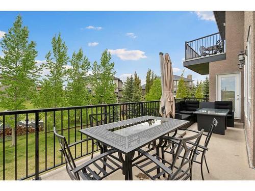 210 Montenaro Place, Rural Rocky View County, AB - Outdoor With Balcony With Deck Patio Veranda With Exterior