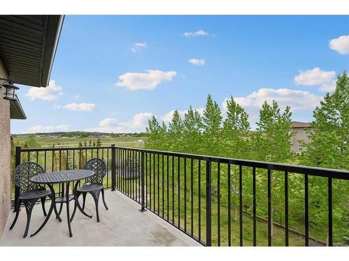 210 Montenaro Place, Rural Rocky View County, AB - Outdoor With Balcony