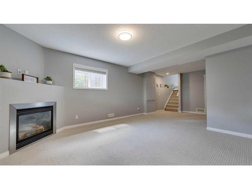 291 Covepark Rise Ne, Calgary, AB - Indoor With Fireplace