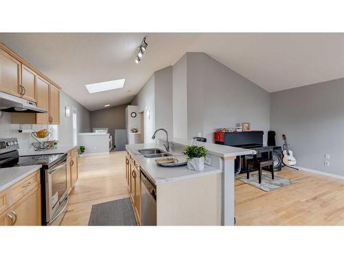 291 Covepark Rise Ne, Calgary, AB - Indoor Photo Showing Kitchen With Double Sink