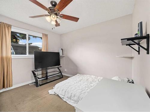 143 Penmeadows Close Se, Calgary, AB - Indoor Photo Showing Bedroom