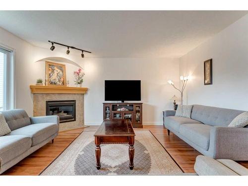 266 Citadel Meadow Grove Nw, Calgary, AB - Indoor Photo Showing Living Room With Fireplace