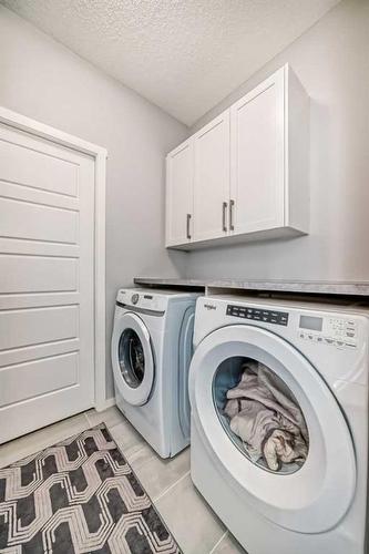 300 Walgrove Boulevard Se, Calgary, AB - Indoor Photo Showing Laundry Room