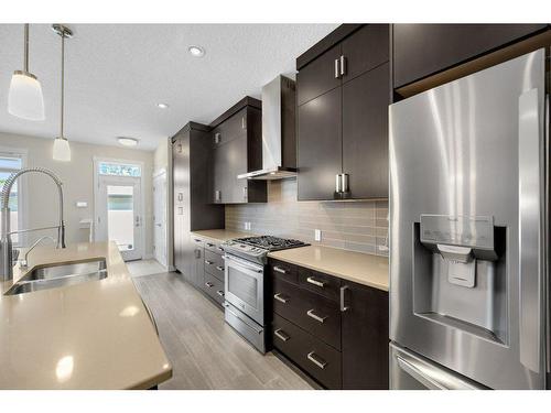 1712 19 Avenue Nw, Calgary, AB - Indoor Photo Showing Kitchen With Double Sink With Upgraded Kitchen