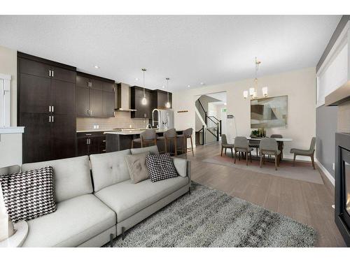 1712 19 Avenue Nw, Calgary, AB - Indoor Photo Showing Living Room With Fireplace