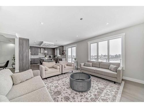 150 Sandpiper Park, Chestermere, AB - Indoor Photo Showing Living Room