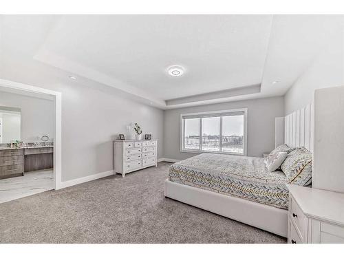 150 Sandpiper Park, Chestermere, AB - Indoor Photo Showing Bedroom