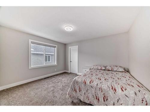 150 Sandpiper Park, Chestermere, AB - Indoor Photo Showing Bedroom