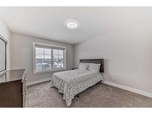 150 Sandpiper Park, Chestermere, AB - Indoor Photo Showing Bedroom