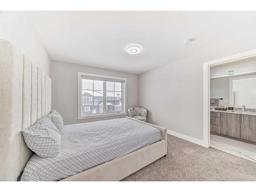 150 Sandpiper Park, Chestermere, AB - Indoor Photo Showing Bedroom