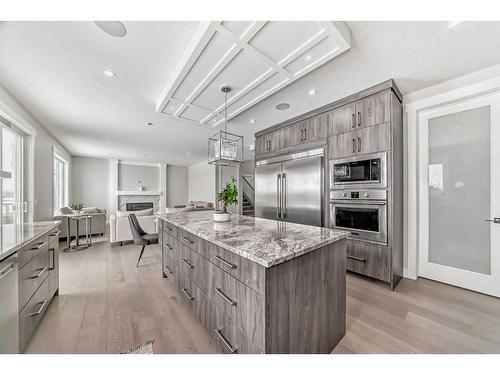 150 Sandpiper Park, Chestermere, AB - Indoor Photo Showing Kitchen With Upgraded Kitchen