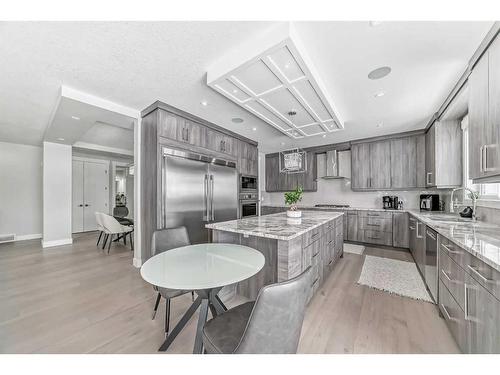 150 Sandpiper Park, Chestermere, AB - Indoor Photo Showing Kitchen With Upgraded Kitchen