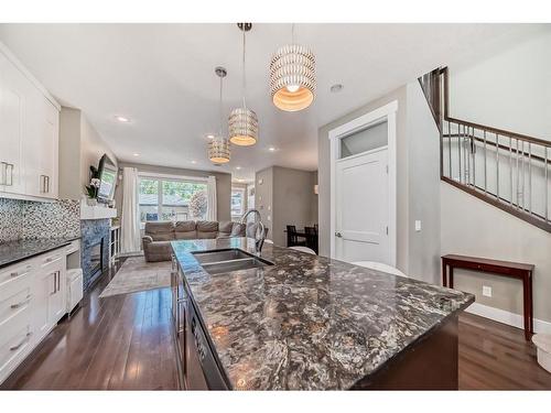 427 12 Avenue Ne, Calgary, AB - Indoor Photo Showing Kitchen With Double Sink With Upgraded Kitchen