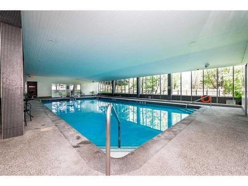 608-4944 Dalton Drive Nw, Calgary, AB - Indoor Photo Showing Other Room With In Ground Pool