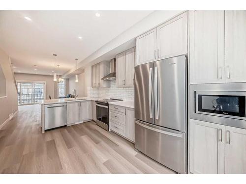 730 Sage Hill Grove Nw, Calgary, AB - Indoor Photo Showing Kitchen With Stainless Steel Kitchen With Upgraded Kitchen