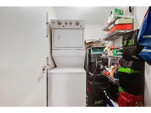 208-2218 30 Street Sw, Calgary, AB - Indoor Photo Showing Laundry Room