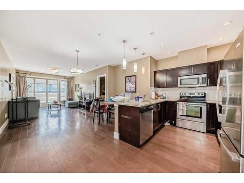 215-1899 45 Street Nw, Calgary, AB - Indoor Photo Showing Kitchen With Stainless Steel Kitchen With Upgraded Kitchen