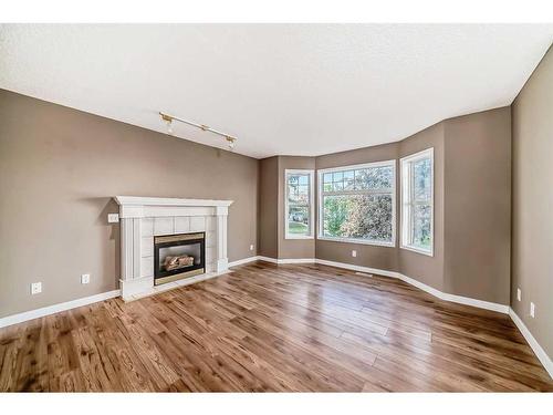 43 Covington Close Ne, Calgary, AB - Indoor Photo Showing Living Room With Fireplace
