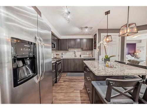 1205-99 Copperstone Park Se, Calgary, AB - Indoor Photo Showing Kitchen With Upgraded Kitchen