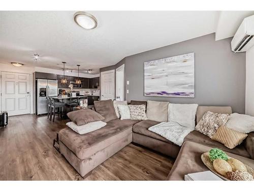 1205-99 Copperstone Park Se, Calgary, AB - Indoor Photo Showing Living Room