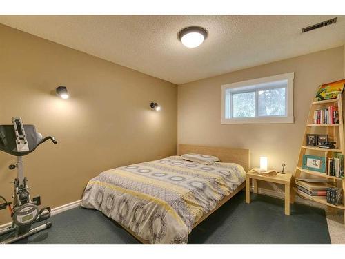 444 Cedarpark Drive Sw, Calgary, AB - Indoor Photo Showing Bedroom