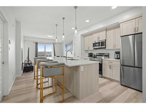 411-40 Carrington Plaza Nw, Calgary, AB - Indoor Photo Showing Kitchen With Stainless Steel Kitchen With Upgraded Kitchen